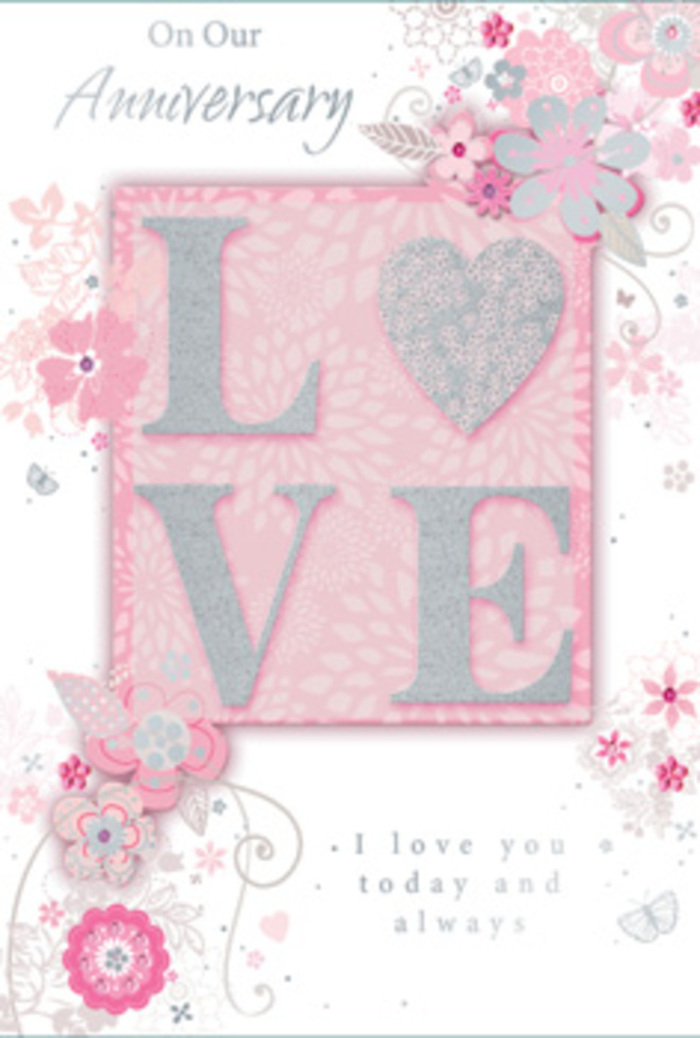 The anniversary card pictured here radiates a calm, enduring romance, like a well-loved story shared over many evenings in Hatch End. Its central motif is the word "LOVE," printed in bold, raised capitals that you can almost feel lifting from the surface. Each letter is delicately trimmed with sparkling glitter, creating a frosted effect that shimmers gently when light touches it, reminiscent of early morning brightness along local tree-lined streets. This central word is anchored on a blush-pink panel, slightly darker than the surrounding background, which adds a sense of depth and focus. From this core, an intricate array of hand-drawn blossoms and trailing leaves spills outward. The blooms, in shades of soft pink, rose, mauve, and understated grey, have an airy, sketched quality, suggesting the first imaginative lines of a florist planning a romantic anniversary arrangement. Slim vines and swirling tendrils weave between the flowers, their movements echoing the graceful curves of handwritten script. The backdrop is a washed pale pink, smooth and even, providing a gentle canvas that lets the silver and white highlights stand out. Subtle touches of silver foil adorn selected petals, leaf edges, and delicate flourishes, glinting just enough to suggest celebration without overwhelming the design. Laced through the composition, elegant script shares an anniversary message of enduring affection, the letters slim and stylish. The entire card exudes a sense of quiet gratitude and lasting commitment, much like the feeling of ordering a favourite bouquet year after year from Florist Hatch End, confident that the gesture will say everything your heart intends.